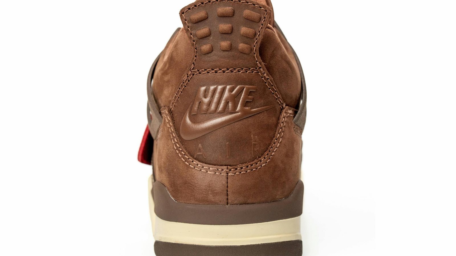 Air Jordan 4 "Bin 23" goes Western with bolo laces and a pony-hair cage