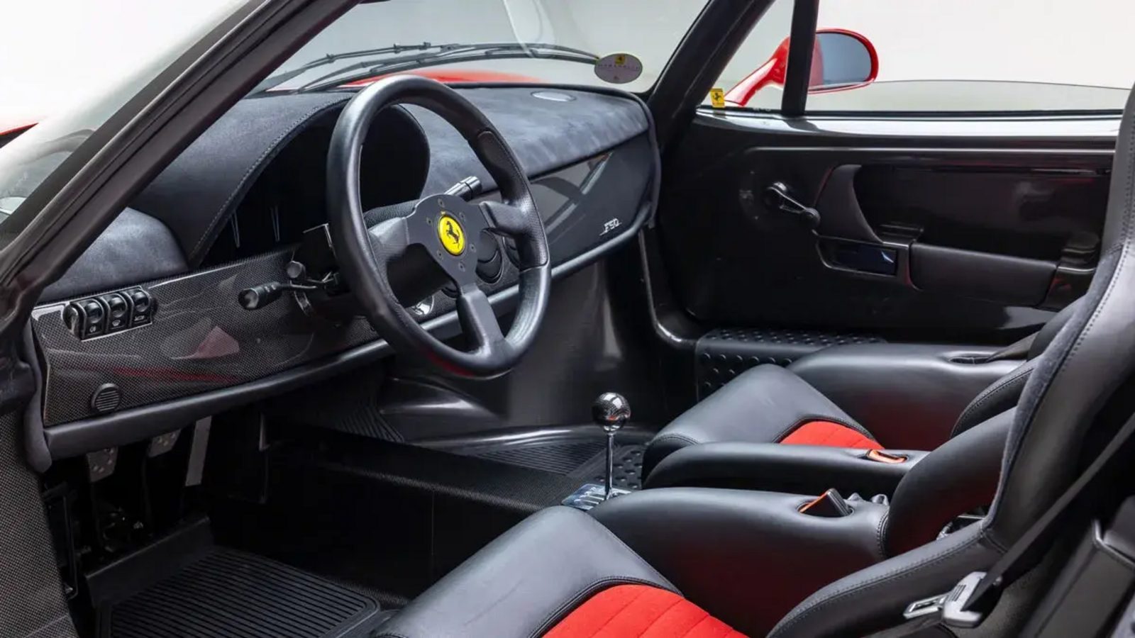 Ferrari F50 with 106 miles heads to auction with a $20 million-plus estimate